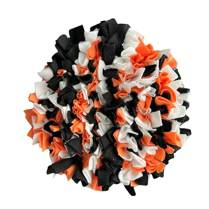 Round handmade snuffle mat in black, white and orange fleece